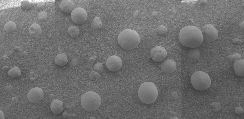 Martian spherules showcasing evidence of water