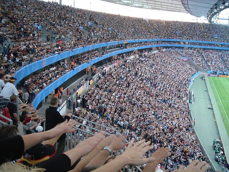 Crowd wave at a football game