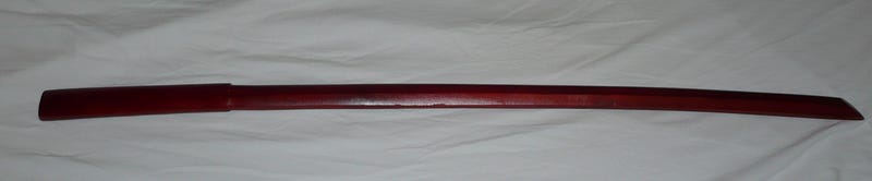 Image of a wooden sword, a bokken.