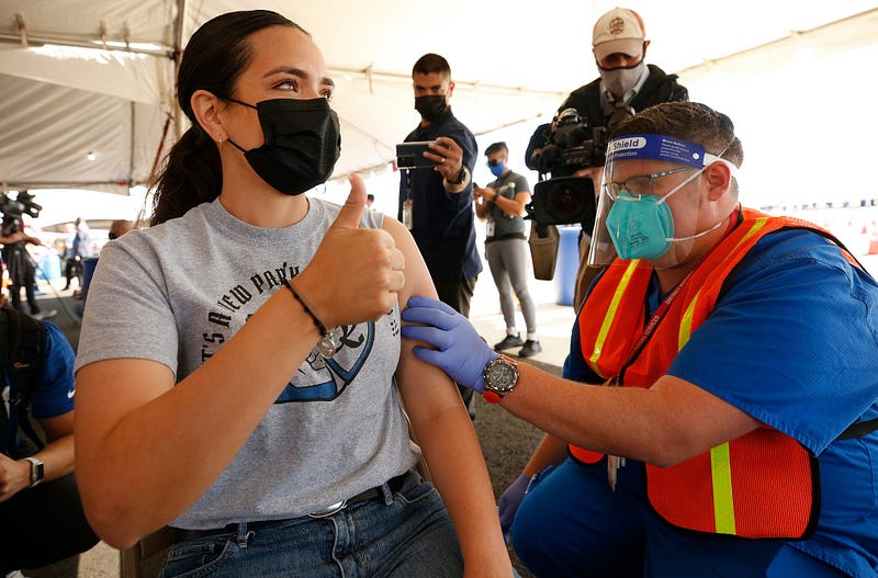 A woman receiving the COVID-19 vaccine in Los Angeles